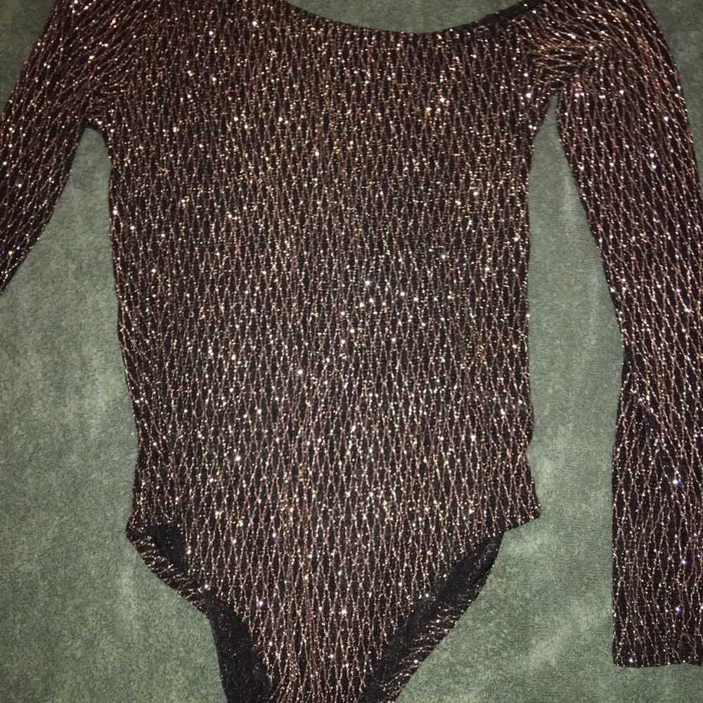 Never worn Fashion Nova bodysuit.